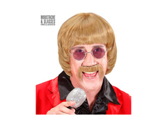 Szőke parókás énekesnő az 1960-as évekből. bajusszal és szemüveggel