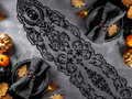 Halloween koponyák fekete asztali futó - 35 x 180 cm - 1 db.